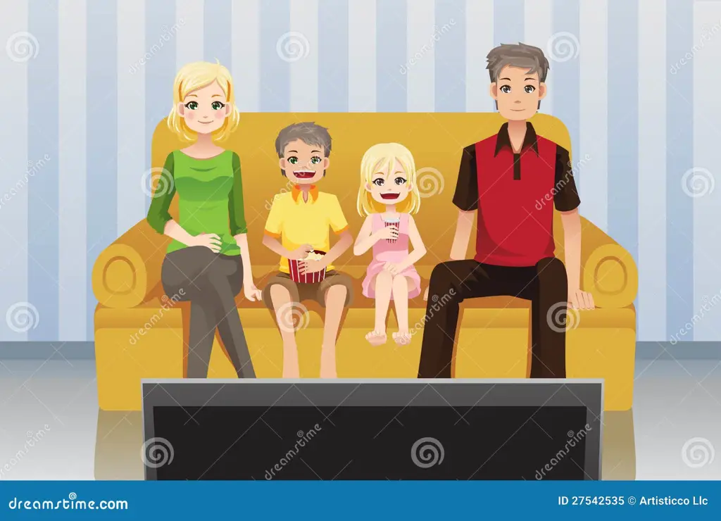 Momen Keakraban Menonton Film Animasi Sebuah keluarga sedang menonton film animasi bersama-sama di rumah